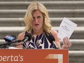 Rachel Notley and Labour Critic Christina Gray present a fully drafted bill that provides Alberta workers with 10 days of paid sick leave to reduce the spread of COVID-19 and help bring the pandemic to an end. Notley calls on Jason Kenney to re-open the assembly and pass this critical legislation. Taken on Monday, May 17, 2021 in Edmonton.