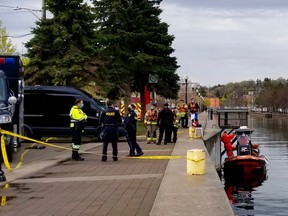 First responders by the east harbour wall Sunday morning, after a report of a vehicle driving into the water just after 5 a.m. Sunday in Owen Sound, Ont. (Scott Dunn/The Sun Times/Postmedia Network)