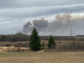 A wildfire burns in Parkland County near the village of Tomahawk on May 7, 2021.