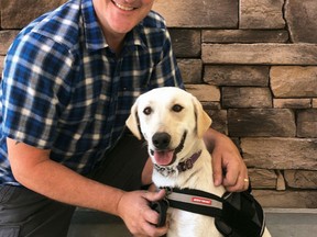 James Wood, Owner of Assured K-9 Detection Services, with rescue his dog Rebel, the certified bed bug buster. Photo submitted.