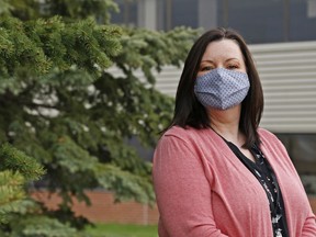 Janet Evans of Addictions and Mental Health Services-Hastings Prince Edward stands outside the agency's Belleville office. She is among the mental-health professionals emphasizing the importance of keeping in touch with other people as a way of easing pandemic stress and loneliness.