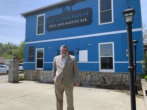 Brant Mayor David Bailey stands in front of the former Cedar House Restaurant in Paris. Brant councillors have cleared the way for the building's demolition after recommending it not designated under the Ontario Heritage Act.