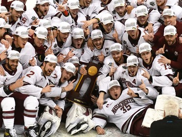 UMass celebrates its 5-0 win over St. Cloud State  in the championship game of the 2021 Frozen Four NCAA hockey tournament in Pittsburgh.
Philip G. Pavely-USA TODAY Sports