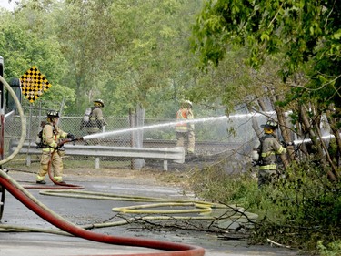 Firefighters battle the blaze from the north end of Hamilton Street. (RONALD ZAJAC/The Recorder and Times)