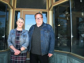 Ryan and Andrea Devos are shown outside Devos Furniture, their downtown Chatham business, May 14, 2021. The furniture store has won the Chatham-Kent Chamber of Commerce's small business of year award.