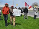 Several Canadian Charter of Rights signs were proudly displayed during the lockdown protest on Saturday, May 1, 2021, in Cornwall, Ontario.  Francis Racine/Cornwall Standard-Freeholder/Postmedia Network