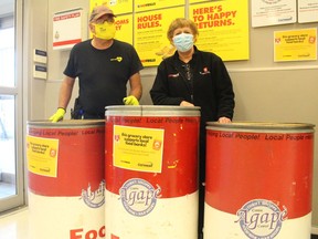 The latest edition of Cornwall Curbs Hunger will continue into the weekend, and at the drop-off bins at James and Jenn's No Frills on Wednesday afternoon were store employees Dennis Carriere and Charlene Leger. Photo on Wednesday, May 19, 2021, in Cornwall, Ont. Todd Hambleton/Cornwall Standard-Freeholder/Postmedia Network