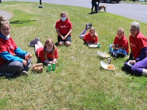 A volunteer group of mostly youth, enjoying a well-deserved lunch at a gathering area near Cornwall Harbour, after the morning cleanup walk.Photo on Saturday, May 29, 2021, in Cornwall, Ont. Todd Hambleton/Cornwall Standard-Freeholder/Postmedia Network
