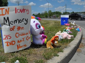 Cornwall residents were encouraged to drop off stuffed animals on the corner of Lemay Street and McConnell Avenue on Monday May 31, 2021 in Cornwall, Ont. in order to commemorate the 215 children whose remains were found at the former Kamloops Indian Residential School in British Columbia last week.  Francis Racine/Cornwall Standard-Freeholder/Postmedia Network