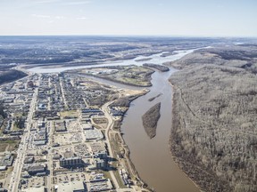 An aerial view of downtown Fort McMurray Alta. next to the Athabasca and Clearwater River on Thursday May 4, 2017. Robert Murray/Fort McMurray Today/Postmedia Network