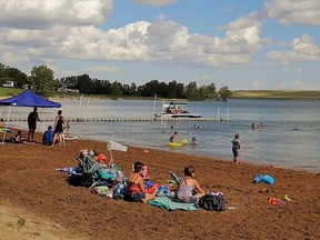 People enjoy a sunny day at Prairie Oasis Park. Special Areas Photo