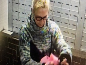 A woman wanted by Kingston Police for a theft from an apartment building in Kingston on April 28.