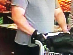One of two men wanted by Kingston Police for stealing a local 93-year-old woman's purse while she was shopping in Kingston on Wednesday morning.