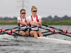 Canadian rowers Jenny Casson, front, of Kingston and Jill Moffatt of Bethany, Ont., in a women's lightweight double sculls race in an undated file photo.