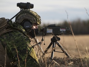 Master Bombardier Mathew Cyr from Joint Terminal Attack Control (JTAC) focuses in on the targets on the range with a lazer, during EXERCISE Maple Strike, at Primrose Lake, Saskatchewan, on May 4, 2021. Photo: Cpl. Justin Roy/4 Wing Imaging