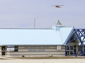 A single engine plane takes off over the Owen Sound Billy Bishop Regional Airport terminal building in this file photo.
(file photo