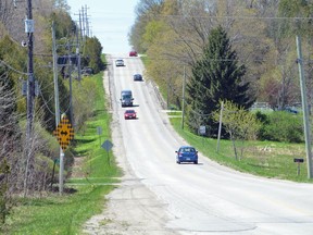 Vehicles travel along Grey Road 17B between Somers Street and Highway 6.