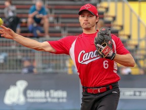 Mitchell native Tyler Pauli (6) completes a play against Argentina during the 2019 men's softball world championships in the Czech Republic. SASCHA SCHNEIDER