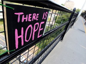 A homemade sign on the High Level Bridge in 2014. On Tuesday, May 18, Ward 2 Coun. Dave Anderson tabled a motion for the mayor to send a letter to the prime minister and premier to outline Strathcona County's support of the implementation of a country-wide 9-8-8 suicide crisis line. Postmedia File