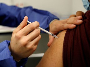 A medical worker administers a dose of the Pfizer-BioNTech vaccine. Appointments booked for today (Tuesday) at a community clinic in Sudbury have been rescheduled for Thursday due to a delay in vaccine shipment. Gonzalo Fuentes/Reuters

NARCH/NARCH30 NARCH/NARCH30