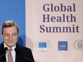 Italian Prime Minister Mario Draghi attends a news conference at a virtual G20 summit on the global health crisis, at Villa Pamphilj in Rome, Italy, on May 21.