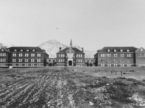 Historical photo of the Kamloops Indian Residential School, once the largest facility in the Canadian Indian Residential School system. Already known to have been the site of 51 student deaths, recent radar surveys have found evidence of 215 unmarked graves. PHOTO BY NATIONAL CENTRE FOR TRUTH AND RECONCILIATION