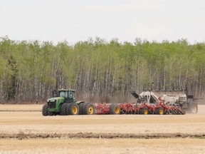 A farmer seeds a field north of Teepee Creek on May 15. The weather has been co-operative for spring field work, although the rain that fell this week is a huge benefit.