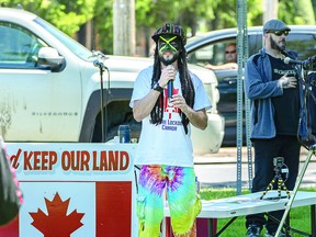 KEANEY LEADS SPEAKERS: Fraser Keaney leads off the list of speakers at the fifth consecutive anti-lockdown protest at Bellevue Park. Sault Ste. Marie Police Service charged two persons under the Reopening Ontario Act for organizing the illegal gathering. BOB DAVIES/SAULT THIS WEEK