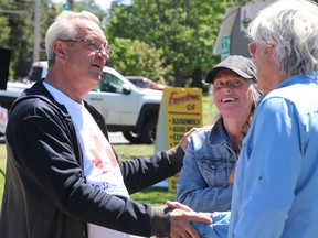 Independent MPP Randy Hillier meets demonstrators at an anti-lockdown protest at Bellevue Park in Sault Ste. Marie on Saturday. BRIAN KELLY