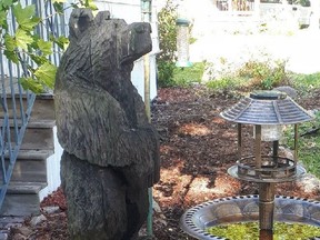 Provincial police say they’re investigating after a large wooden bear – the 1.2-metre carving weighs more than 90 kilograms – was stolen from a small community near Sarnia. (Lambton OPP)