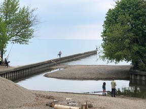 The newly formed beach in Cow Creek has given people new places to fish and camp, but eliminated boat access. Council considers a proposal to dredge the creek May 31, with the cost estimated at up to $300,000, Sarnia's construction manager says. (Submitted photo from Mark Moran)