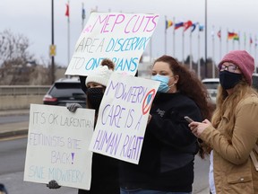 Protesters take part in a rally to fight Laurentian University program closures in May. A series of protest events will be held Feb. 1 in connection with the one-year anniversary of the school declaring insolvency and pursuing a restructuring through the Companies' Creditors Arrangement Act.
