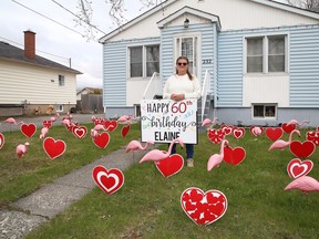 Elaine Sirard, of Lively, Ont., woke up on her birthday on Wednesday May 5, 2021, to find flamingos and hearts on her front yard, thanks to her daughter, Amanda. John Lappa/Sudbury Star/Postmedia Network