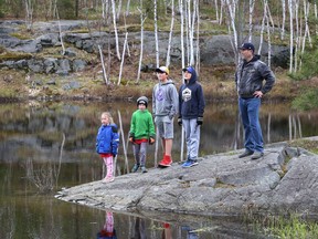 Jonathan Duquette and his kids, Rosalie, 5, left, Oliver, 7, Jonas, 12, and Liam, 10, went for a hike around Lake Laurentian Conservation Area in Sudbury, Ont. on Friday May 7, 2021. John Lappa/Sudbury Star/Postmedia Network