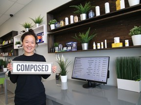 Soo Han, of Cannabis Jacks, stands next to the composed wellness products featured in the store located at 3020 Highway 69 North in Val Caron, Ont. John Lappa/Sudbury Star/Postmedia Network