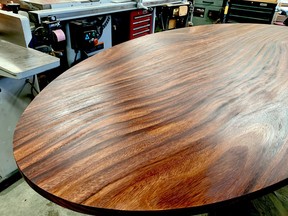 Finishing or refinishing a tabletop is one of the most demanding finishing tasks because the results are seen so closely. Steve finished this acacia wood table top using oil and a power buffing process. Steve Maxwell