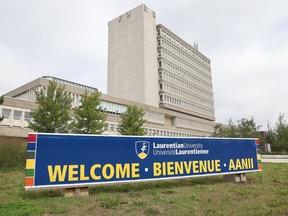A sign has been erected welcoming back students in three languages at Laurentian University in Sudbury, Ont. on Monday August 24, 2020. John Lappa/Sudbury Star/Postmedia Network