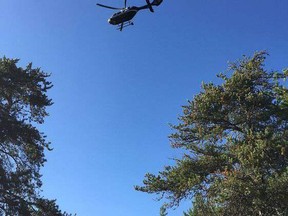 An OPP helicopter circles over Grace Lake in Killarney Provincial Park in August 2020. An OPP chopper was used to find a missing person in Killarney Provincial Park on Friday, May 28, 2021.