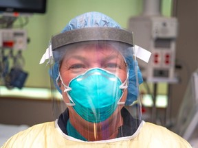 Bluewater Health nurse Kristina Dewhirst gets ready for a shift in the hospital's intensive care unit. Photo provided by Mac Lai for Sarnia This Week