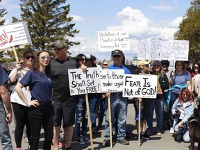 Demonstrators gathered in Hollinger Park Saturday, May 15, participating in a "worldwide Freedom Rally" to protest government imposed health measures aimed at preventing the spread of COVID-19.

RICHA BHOSALE/The Daily Press