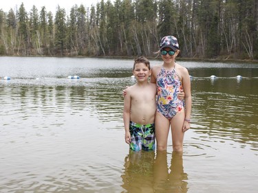 Ty Presseault and his sister Lyla were enjoying a sunny afternoon Friday at Island Lake beach in Kettle Lakes Provincial Park on the park's opening day of the season.

RICHA BHOSALE/The Daily Press