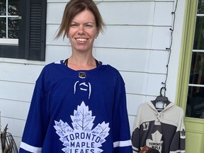 Sarah VanNetten's husband, Mike, is battling COVID-19 in a Hamilton hospital. She is wearing a Toronto Maple Leafs sweater, signed by all of the team's players, which was given to Mike, a big Leafs fan. The back has the No. 13 and her husband's nickname "Chicken." (Submitted)