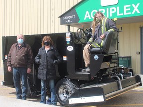 MIllet Town Coun. Robin Brooks, CAO Lisa Schoening and Parks and Rec foreman Tammy Newton unveilled the new electric Zamboni last week.
Christina Max