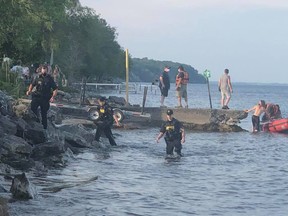 Police, firefighters and Canadian Coast Guard personnel were searching for a missing person off Turkey Point on Saturday. (MacDonald Turkey Point Marina/Facebook photo)