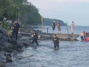 Police, firefighters and Canadian Coast Guard personnel were searching for a missing person off Turkey Point on Saturday. (MacDonald Turkey Point Marina/Facebook photo)