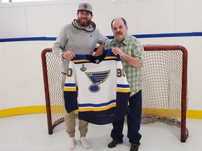 Goderich Resident Jeff Longmire and Stanley Cup Champion Ryan O’Reilly show off a signed jersey that will be up for auction at the 2021 Community Living Golf Tournament. Submitted