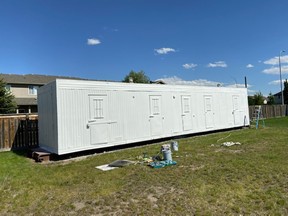 The trailer in question sits primed thanks to David Bowman Painting, and is ready for volunteers to paint a new mural for Luxstone residents.