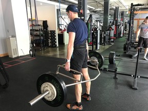 Dr. Reed lifting for endurance performance. Photo submitted