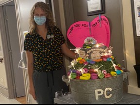 Pinecrest staff memebers put together a basket and thank you card for Griffin (L). SUBMITTED