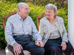 Walter and Lil Parniak, married for 75 years,  enjoy sunny  afternoons in the gardens that surround  their daughter and son-in-law's home on Walls Road.  The property was once part of the Westcap Acres, the Parniak family's farm.